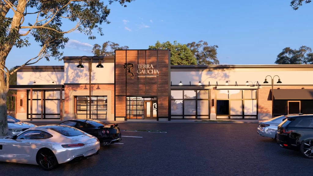 Exterior view of a Terra Gaucha Steakhouse with parked cars in front.