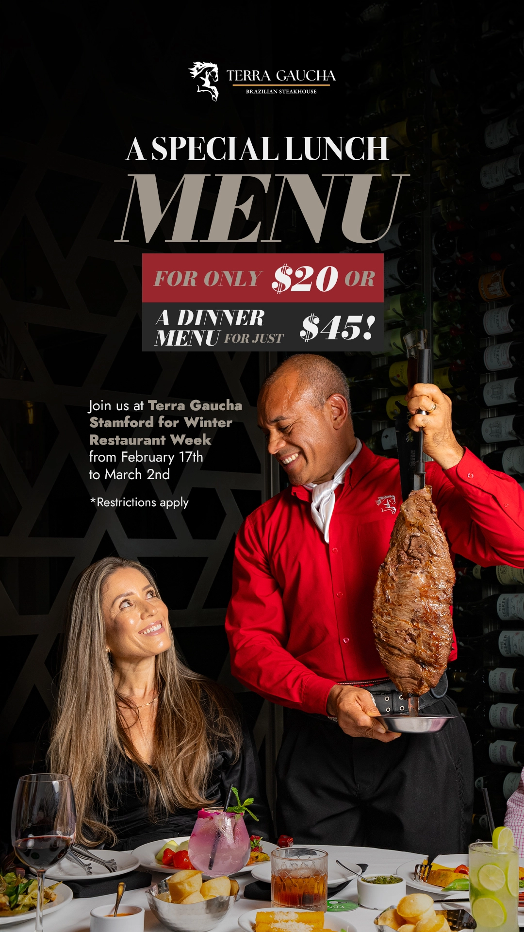 people smiling as a server in a red shirt presents skewered grilled meat at their table.