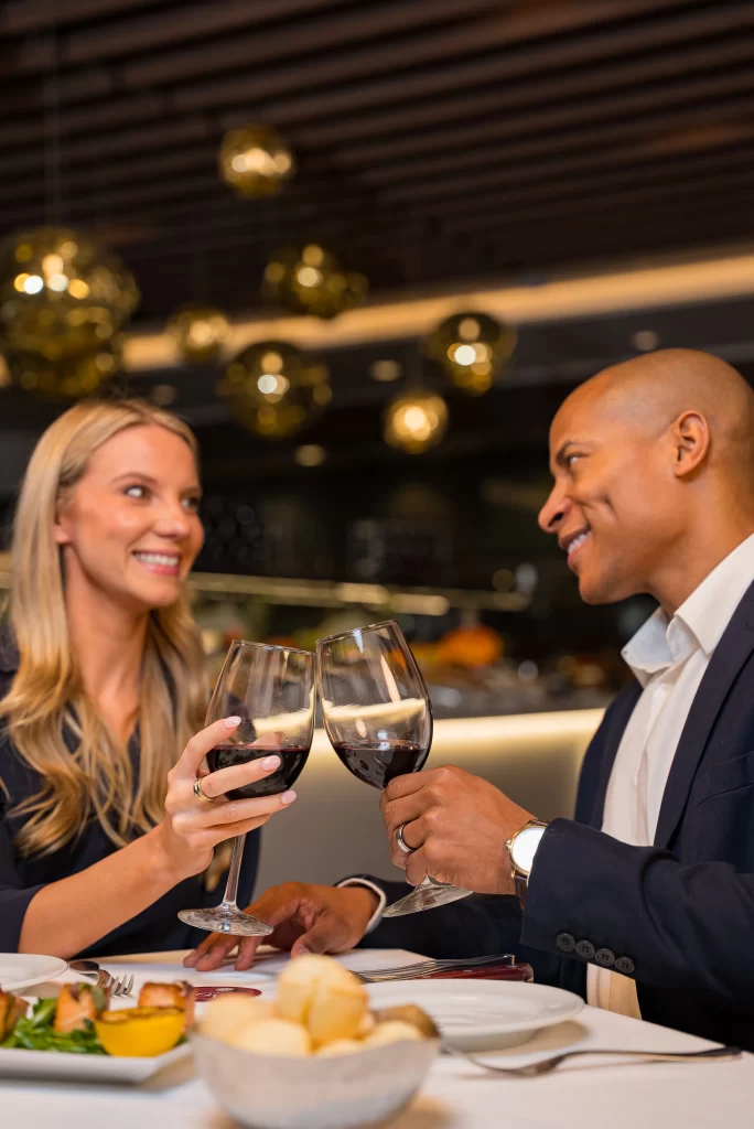 Side view of Terra Gaucha's exterior with wood paneling and outdoor seating.
